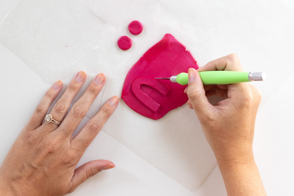 DIY Embossed Earrings with Clay // Make DIY statement earrings with this easy embossing technique for clay using paper embossing sheets! Use your favorite colors and shapes to make unique, lightweight DIY jewelry! #diyjewelry #statementearrings #fashiondiy #accessories #womensfashion #polymerclay #embossed #earrings #jewelry