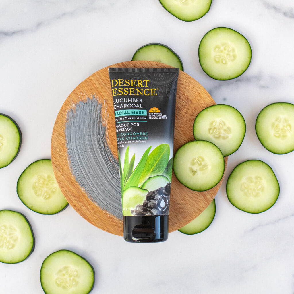 facial mask product surrounded by cucumbers