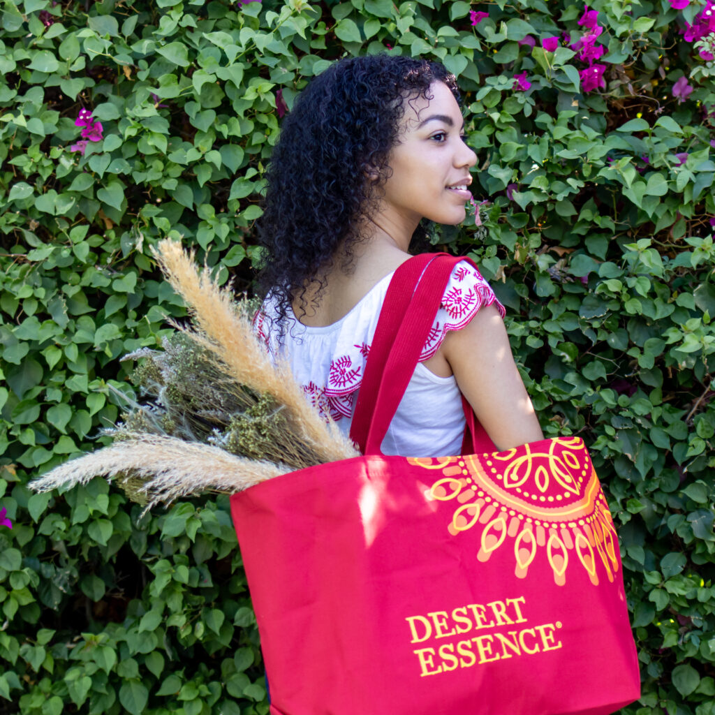 model for content creator holding tote bag for beauty brand