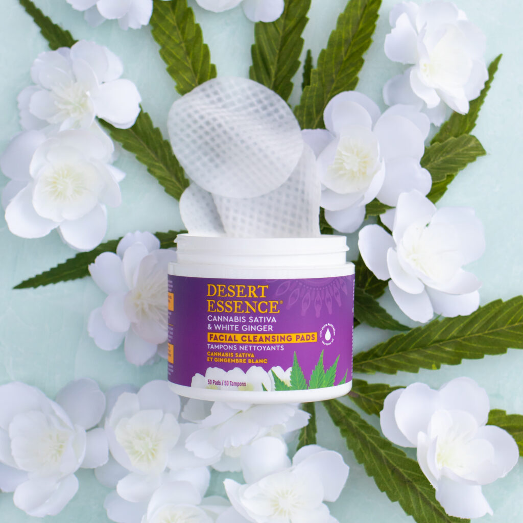 cleansing pads on cannabis leaf background for beauty brand photography